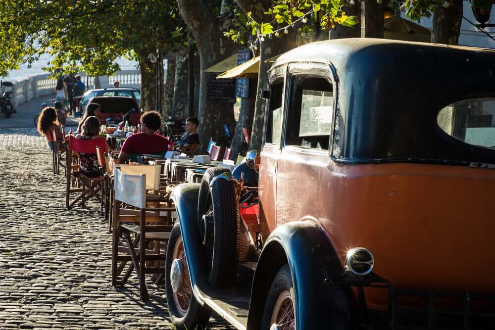 Old car parked in historic quarter in Colonia del Sacramento, Uruguay. Colonia del Sacramento is one of the oldest towns in Uruguay.