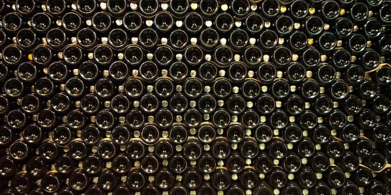 several wine bottles pilled